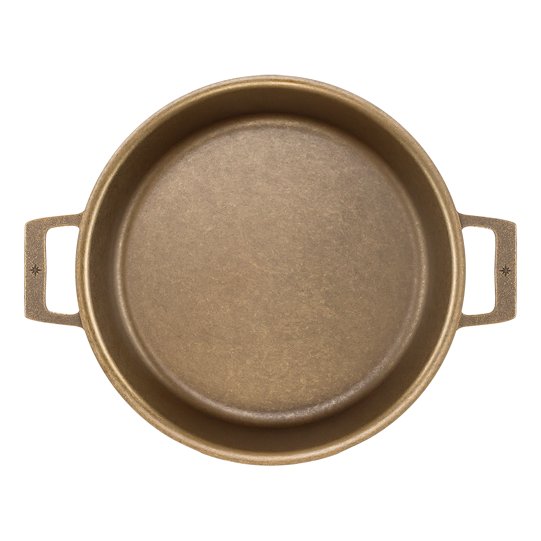 13.5-inch cast iron braiser with large cooking surface, perfect for braising and baking.