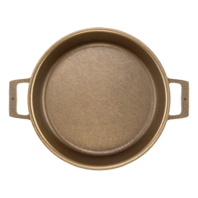 13.5-inch cast iron braiser with large cooking surface, perfect for braising and baking.